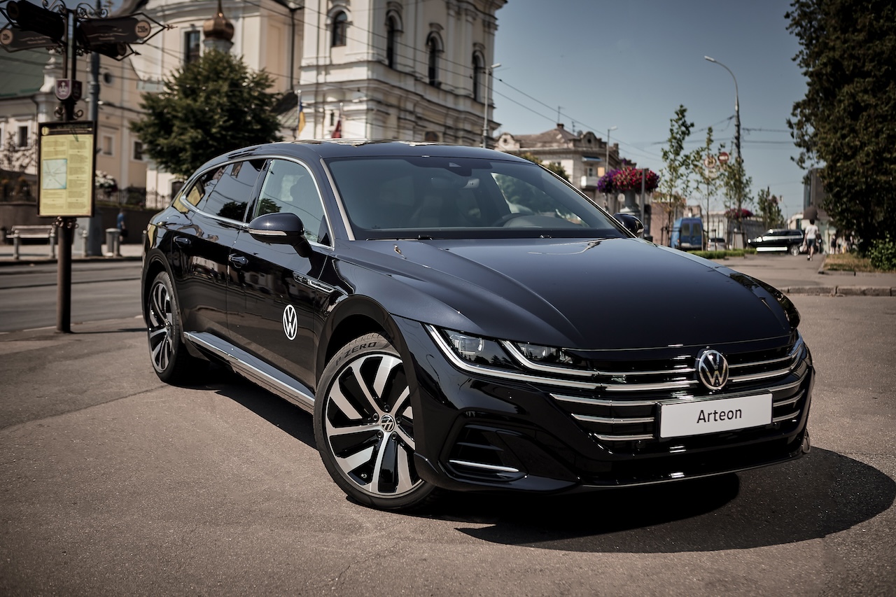 Vinnitsya, Ukraine - 14 July, 2022: Black Volkswagen Arteon R-Line in cityscape background Volkswagen auto repair austin texas